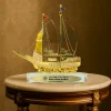 Golden Boat-Shaped Memento in Metal with Glass Base - Image 2